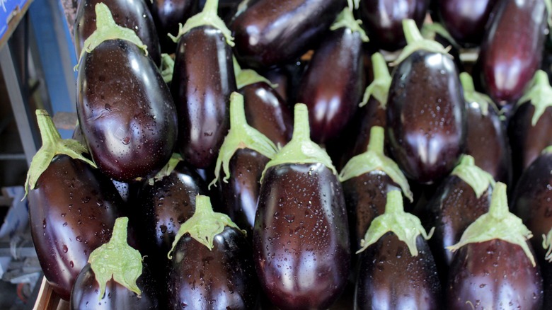 Globe eggplants stacked