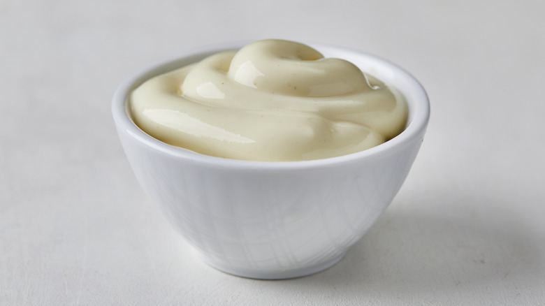 Mayonnaise in white bowl