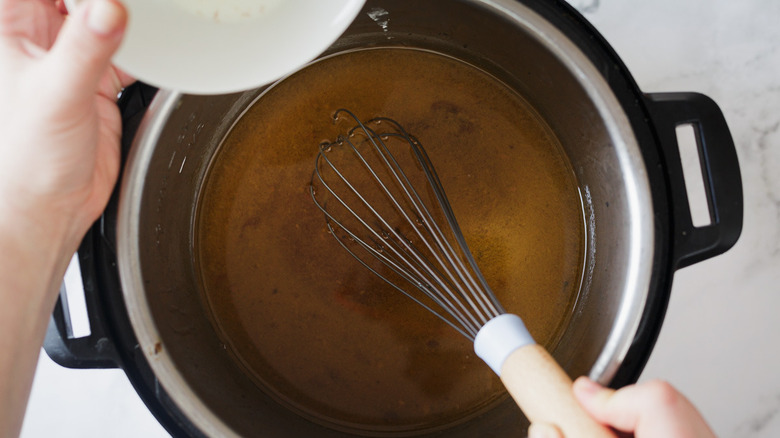 adding cornstarch to pot