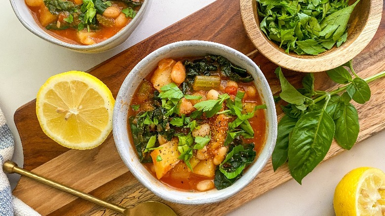 small bowl of stew on serving board