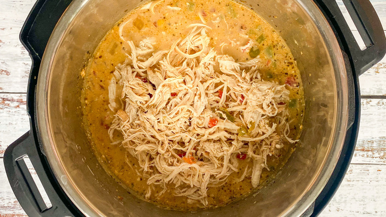 shredded chicken in pot