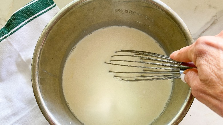 milk in instant pot with whisk