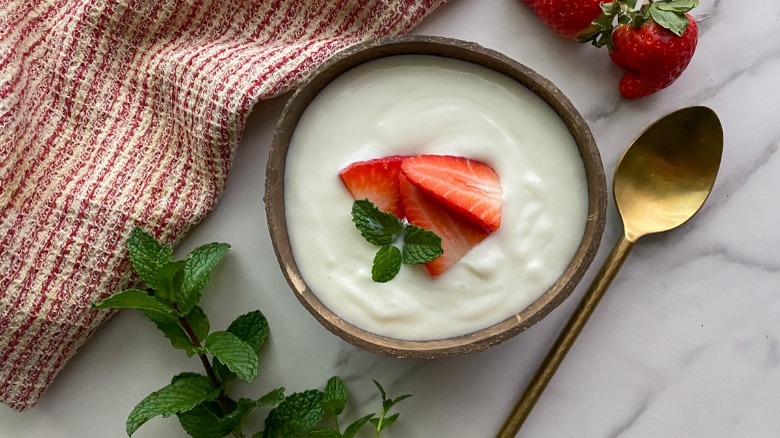 yogurt with strawberries in bowl 