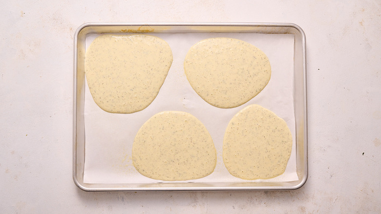 flatbread batter on sheet tray