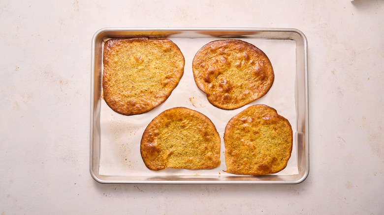 baked flatbreads on sheet tray