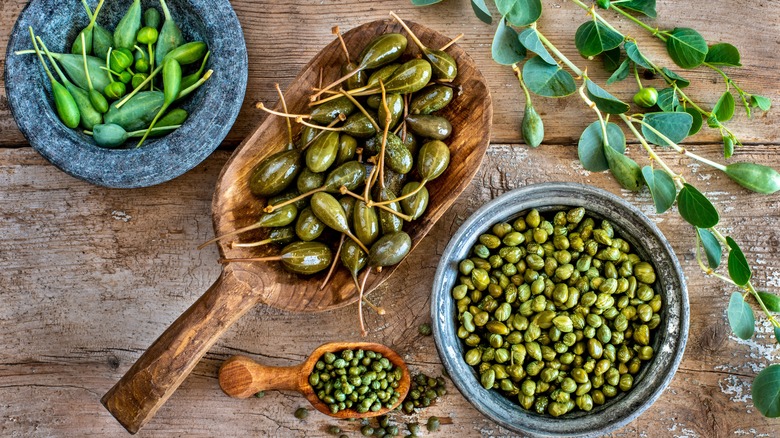 variety of capers on wood