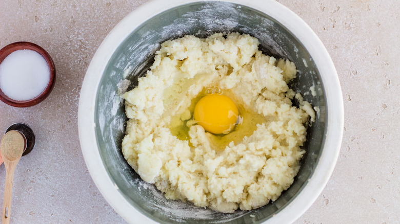 egg in potato mixture