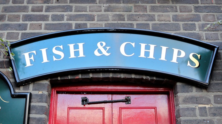 Fish and chips sign on The Anchor Pub in London, England