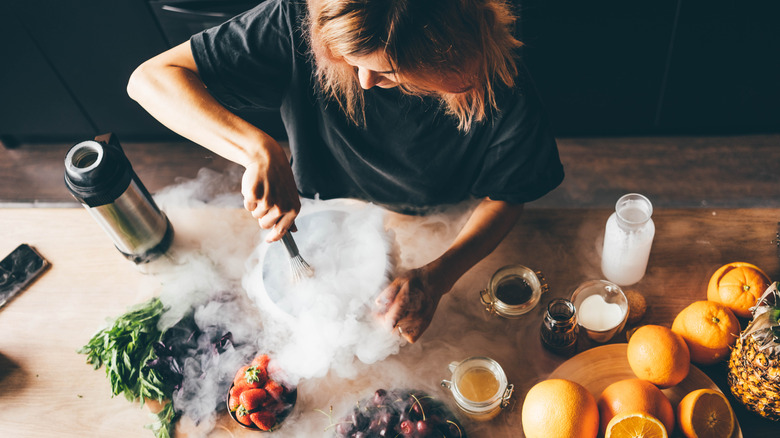 woman cooking with liquid nitrogen 