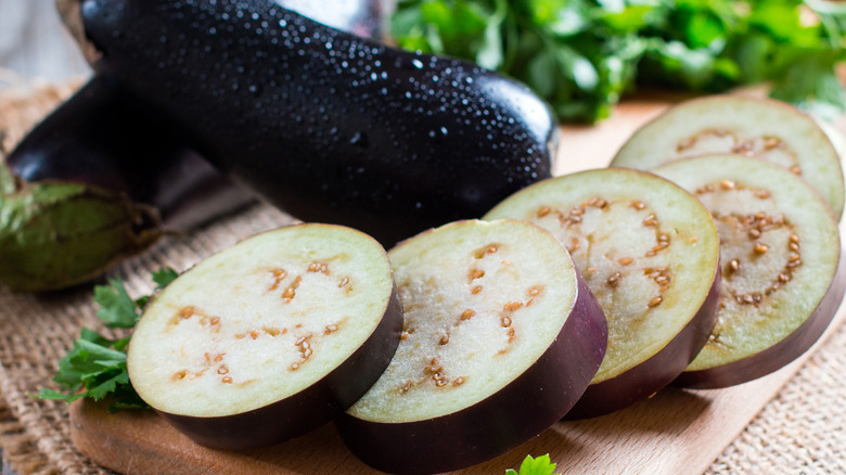 Eggplant on wooden cutting board