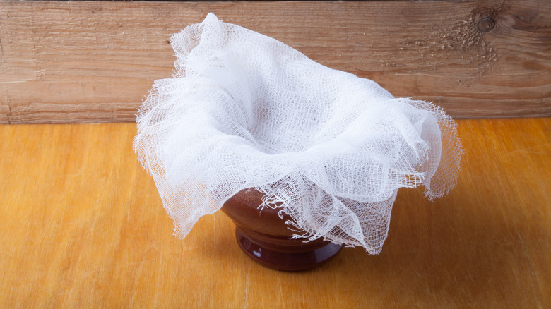 Cheesecloth on a container