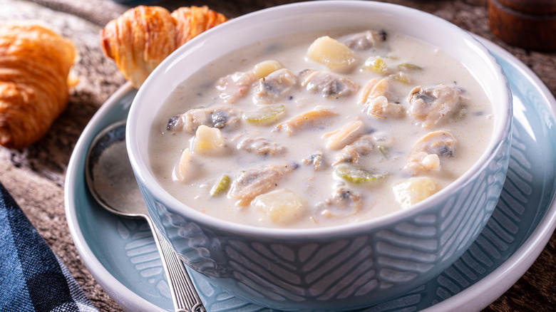 White bowl of homemade New England clam chowder