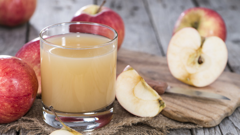 Apple cider with fresh apples