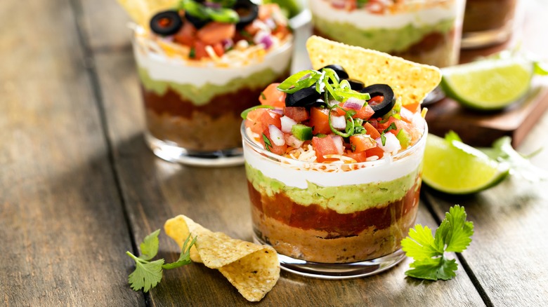 Glasses of seven-layer dip