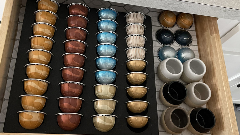 Nespresso capsules in a drawer organizer