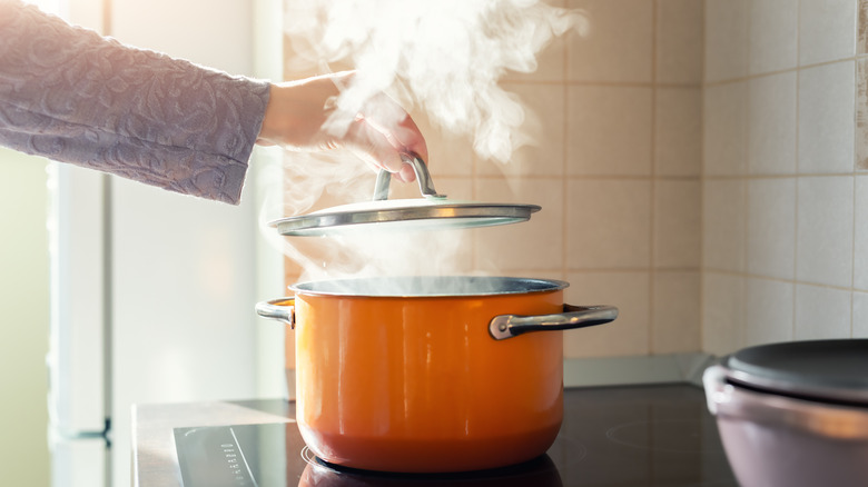 Ceramic pot of boiling water