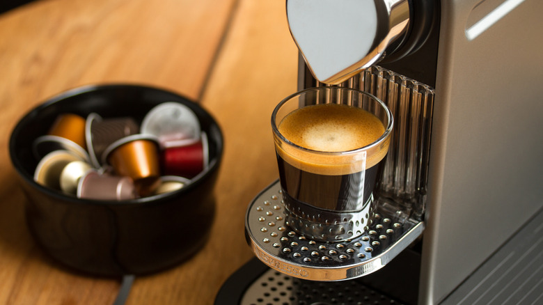 A cup of Nespresso coffee brewed from machine