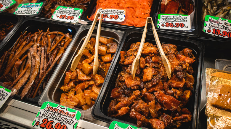 serving trays with seafood snacks in a market