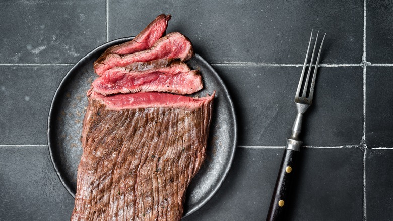 Grilled flap steak on plate