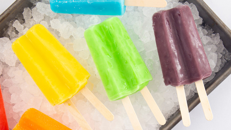 Colorful popsicles on ice