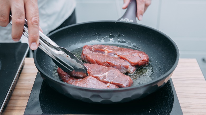 Sautéing ribeye steaks