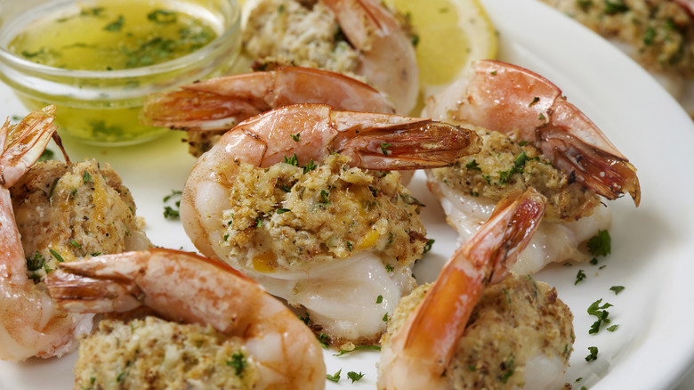 Stuffed shrimp served with herb butter