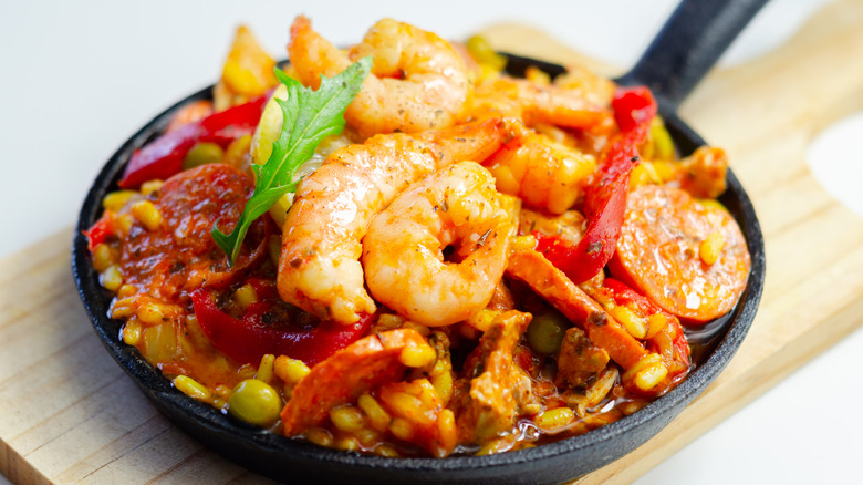 Shrimp resting atop paella pan