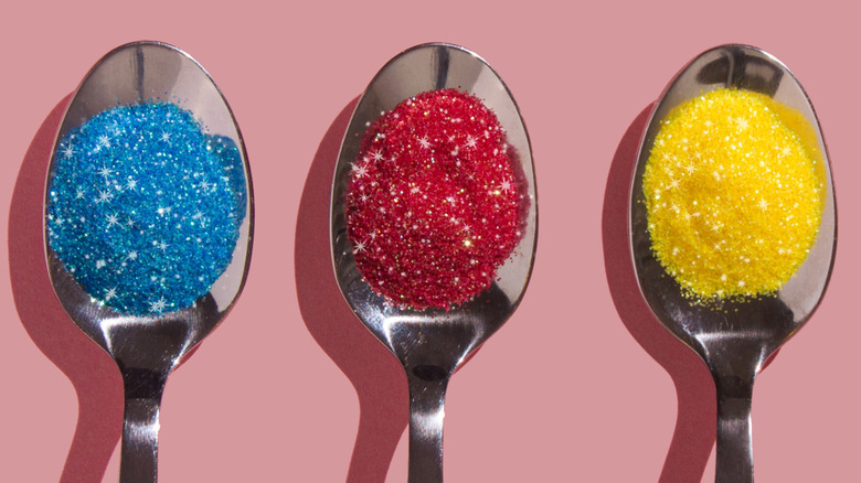 edible glitter in spoons