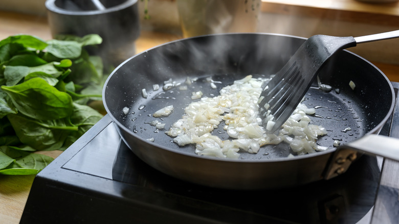 Onions cooking in a frying pan