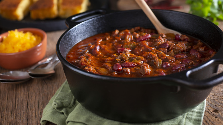 cast iron pot of chili with beans