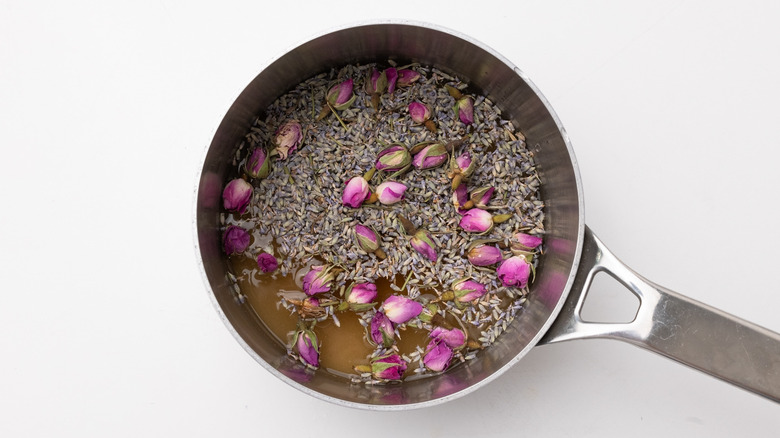 saucepan containing floral syrup ingredients