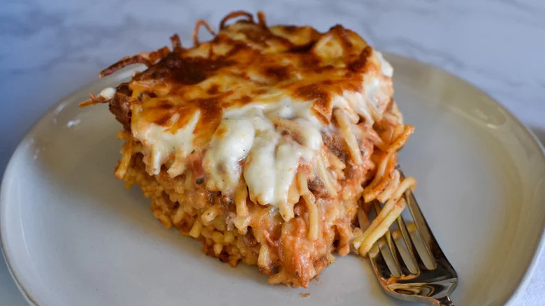 sliced square of baked spaghetti