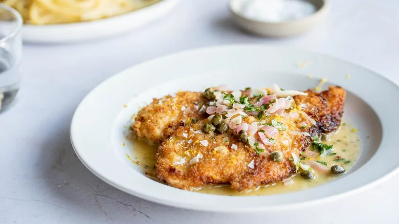 breaded chicken piccata on plate