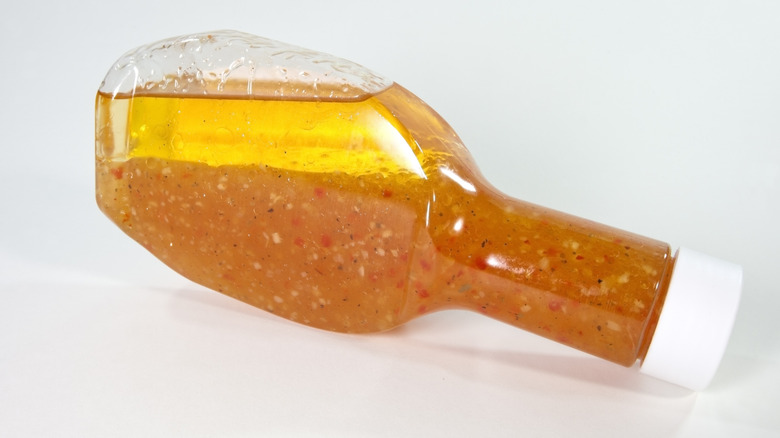 Italian dressing bottle on side