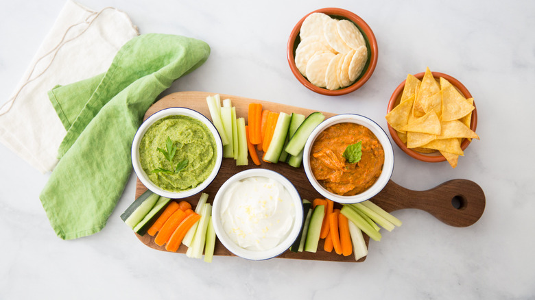 tri-colored dipping sauces on table