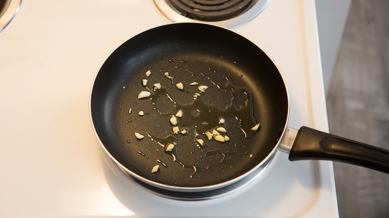 garlic sauteing in frying pan