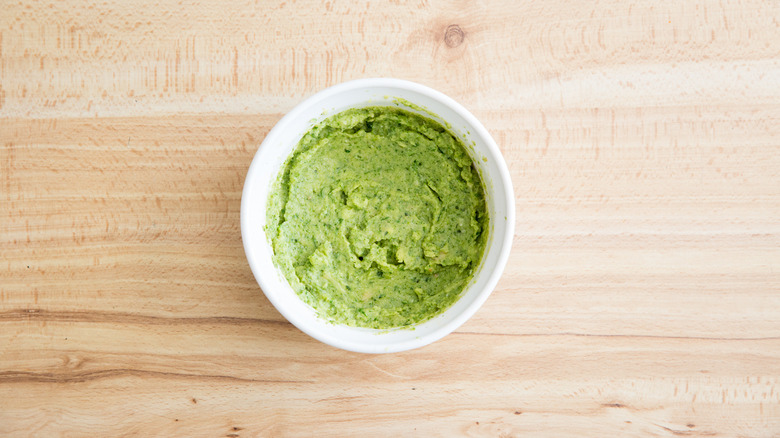 green dipping sauce in bowl