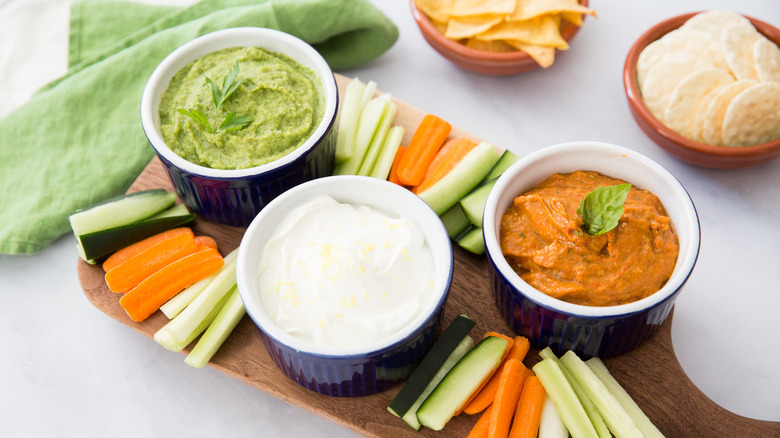 tri-colored dips served on table