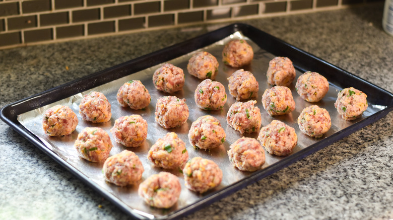 sausage balls on baking sheet