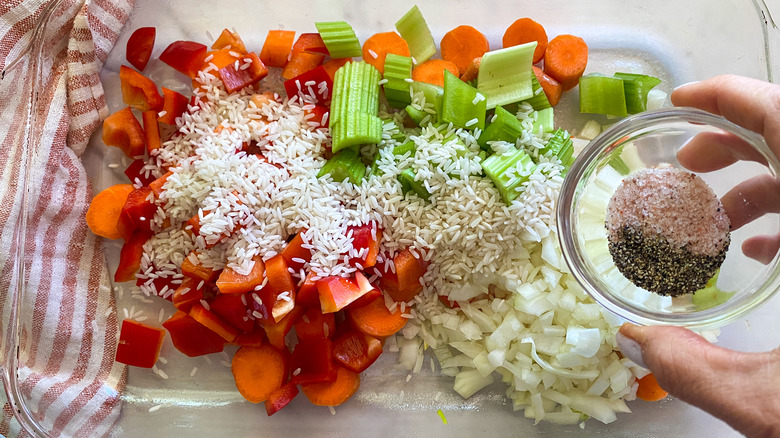 putting ingredients in casserole dish