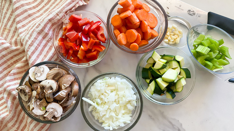 cut vegetables in bowls