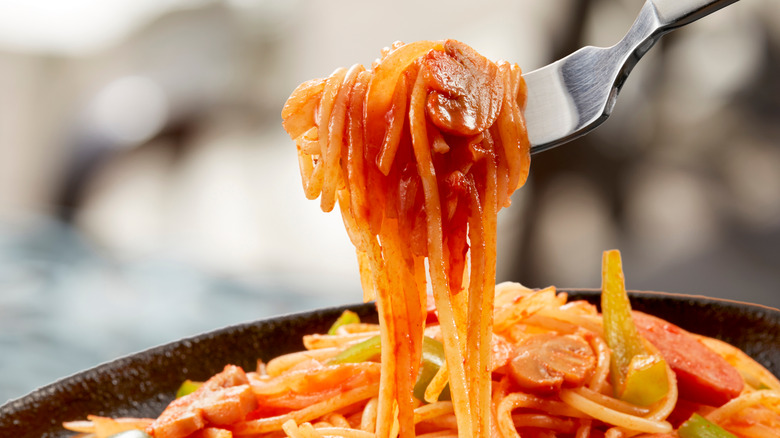 napolitan spaghetti on a fork