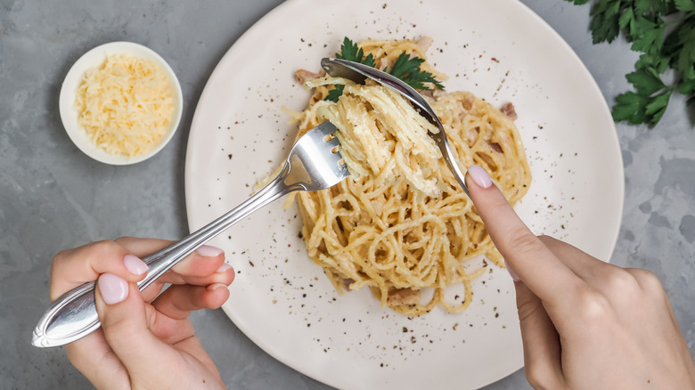 fork twirling in spaghetti