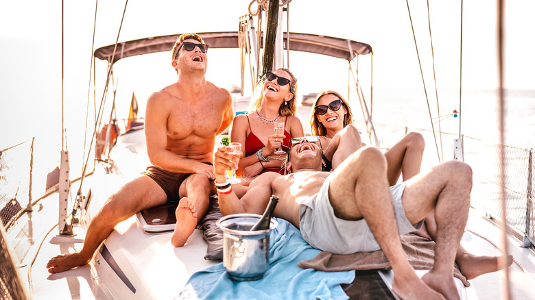 people drinking wine on a boat