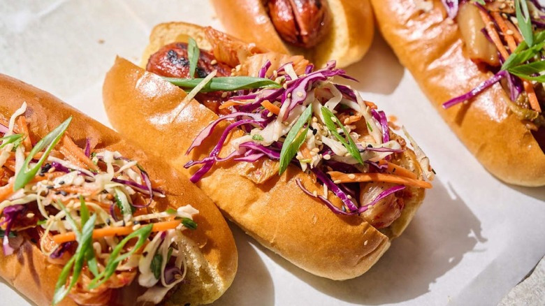 Hot dogs topped with kimchi