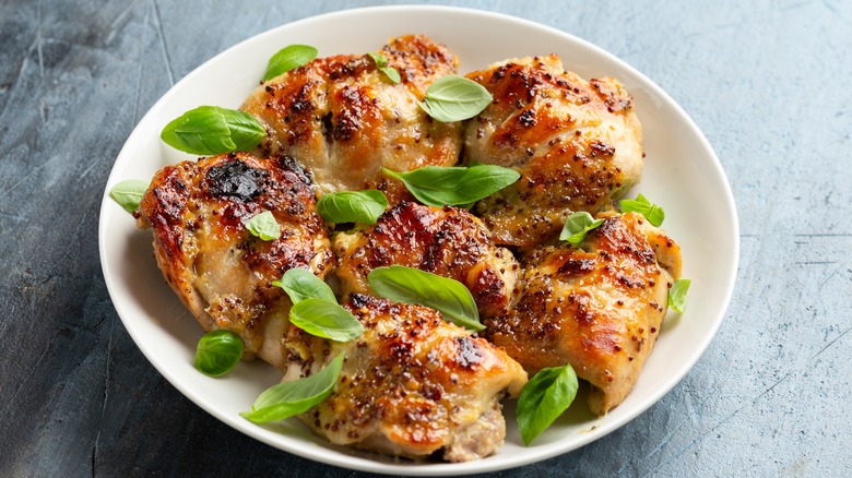 roast chicken thighs on a plate