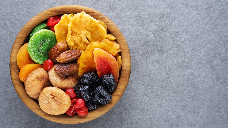 Dried fruit in wooden bowl