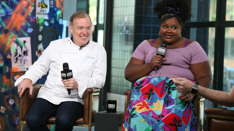 Jacques Torres and Nicole Byer speaking during interview