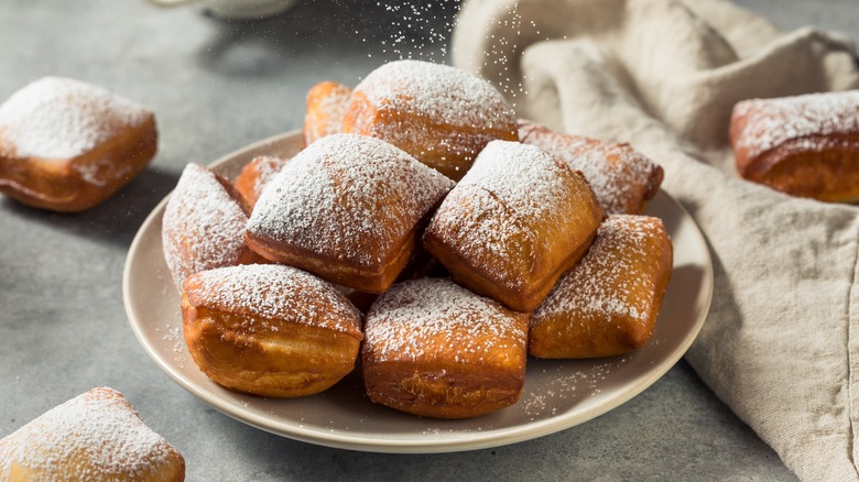 Beignets with powdered sugar coating