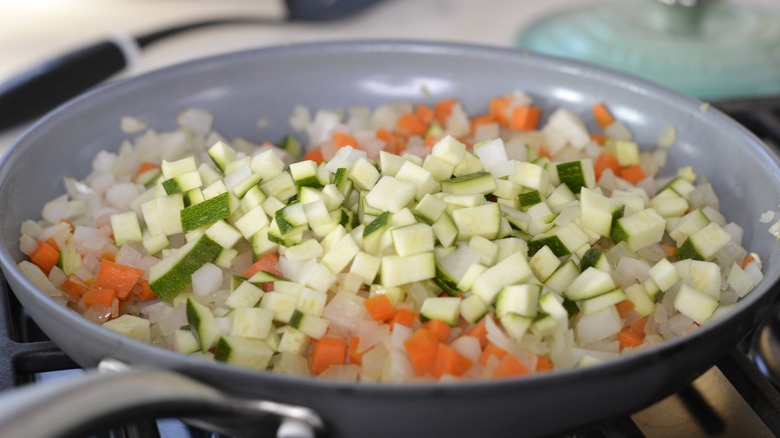 chopped vegetables in frying pan